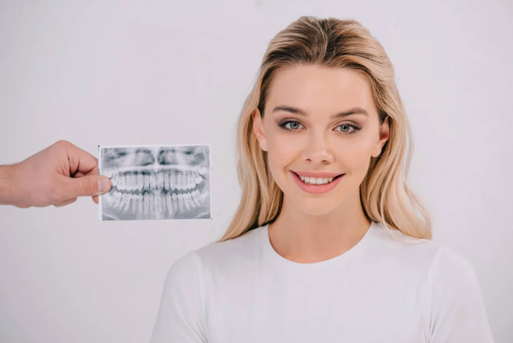 patient smiling after getting braces west palm beach