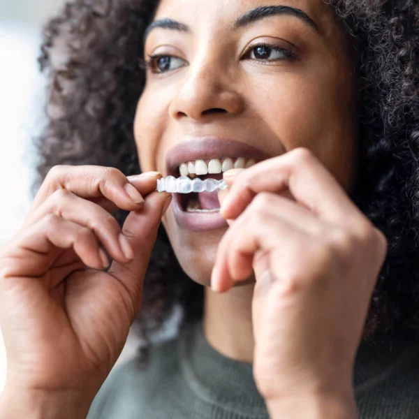 woman about to wear her invisalign west palm beach