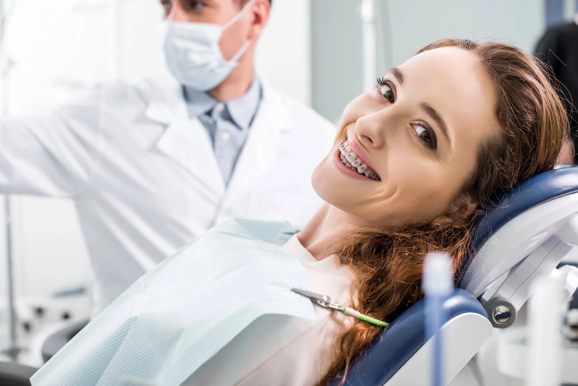 Dental Examination for Ceramic Braces vs Metal Braces Options