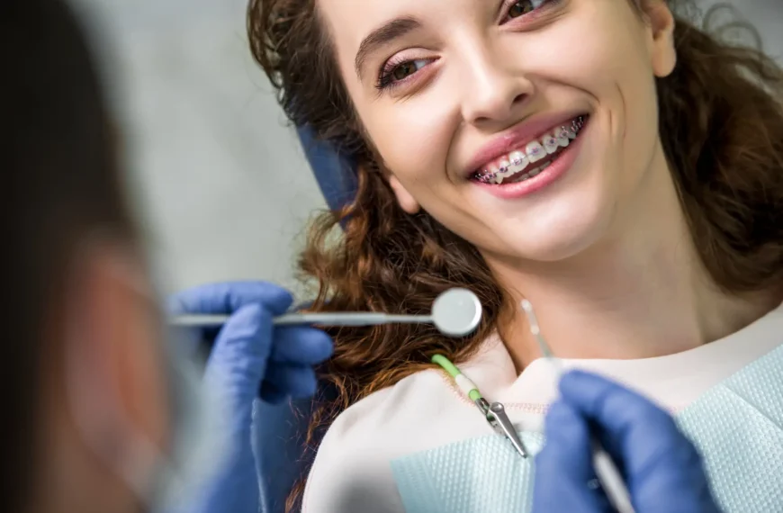 Woman Smiling During Braces West Palm Beach Exam