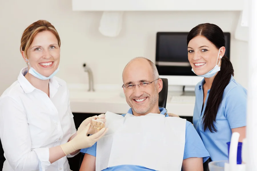 Orthodontists in Forest Hill with a happy patient after dental care